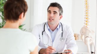 Health Professional Doctor with patient in consultation