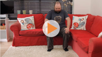 Man sat on sofa