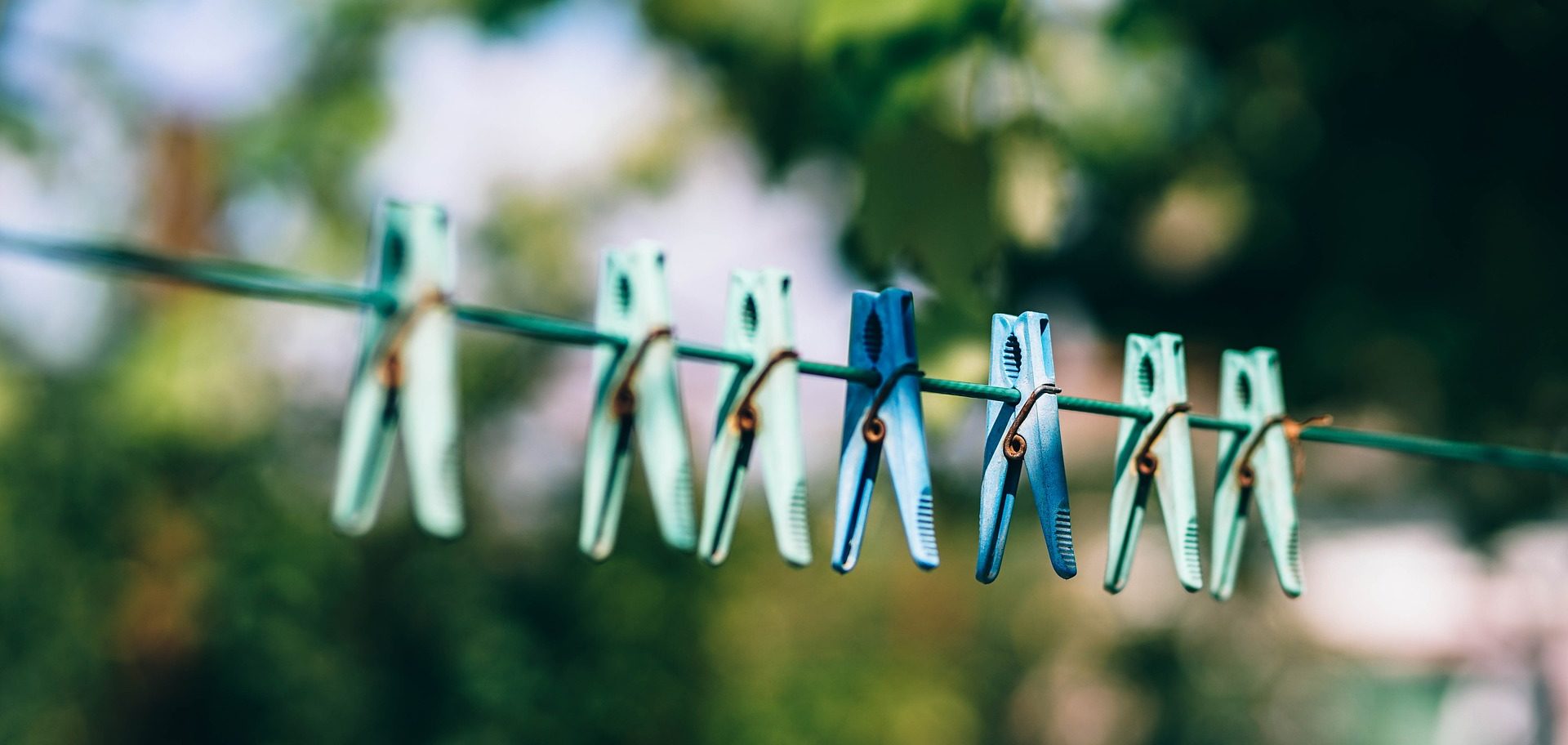 Pegs hanging on a washing line outside